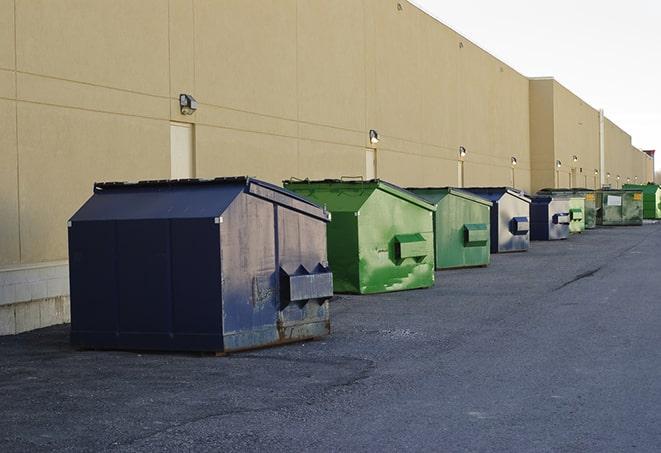 a site supervisor checking a construction dumpster in Chapmansboro